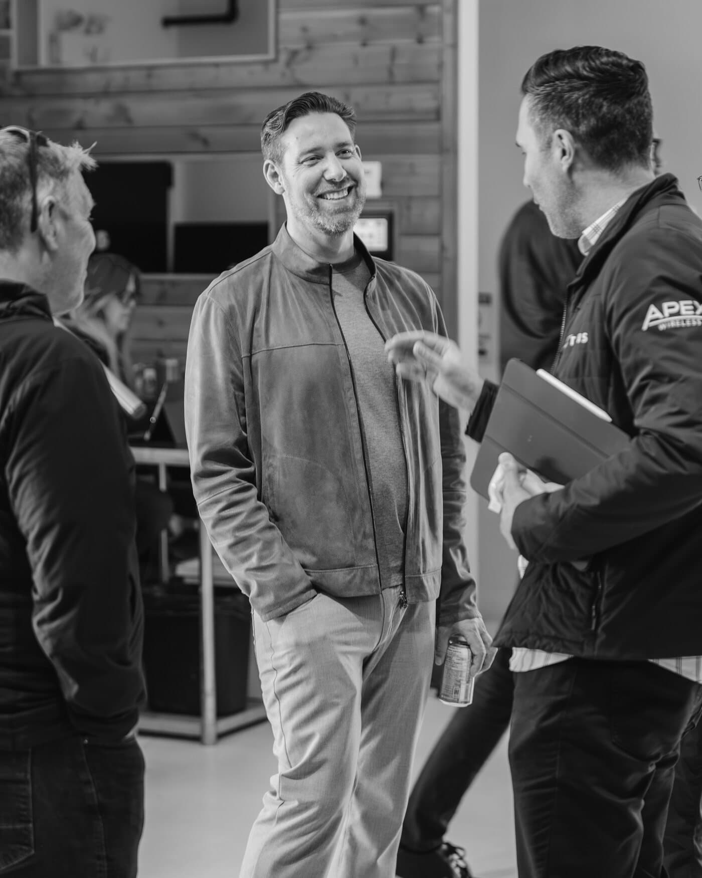 Colin Cox talking with attendees after a Hangar Hangout session in Vancouver